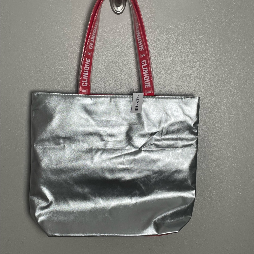 Clinique Silver Metallic Tote with Red Straps